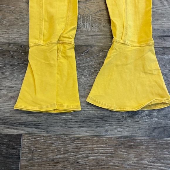 FP Movement by Free People Yellow Flared Leggings EUC size XS - Picture 3 of 5